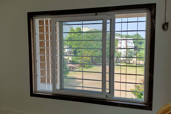 Wide modern sliding glass windows in a living space